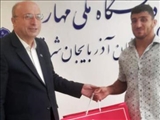 تقدیر رئیس دانشگاه ملی مهارت واحد استانی آذربایجان شرقی از قهرمانی جهانی دانشجوی کشتی گیر